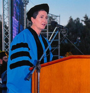 Virginia Bennett addressing graduates at the American College of Greece 