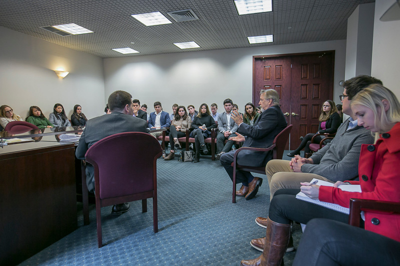 Students listen to arbitration