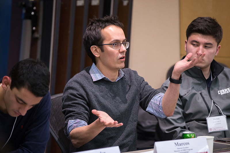 Students participating in a roundtable