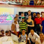 SMART team and children in a Colombian office