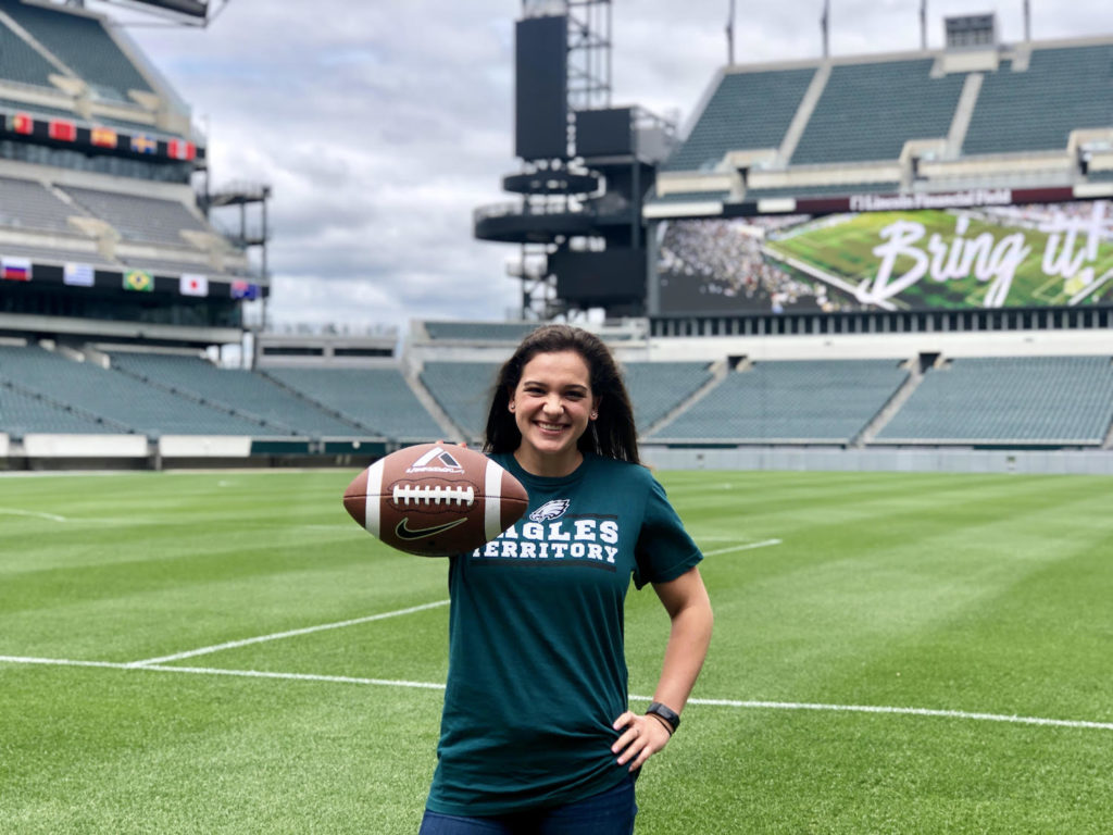 Sarah Baturka holding a football