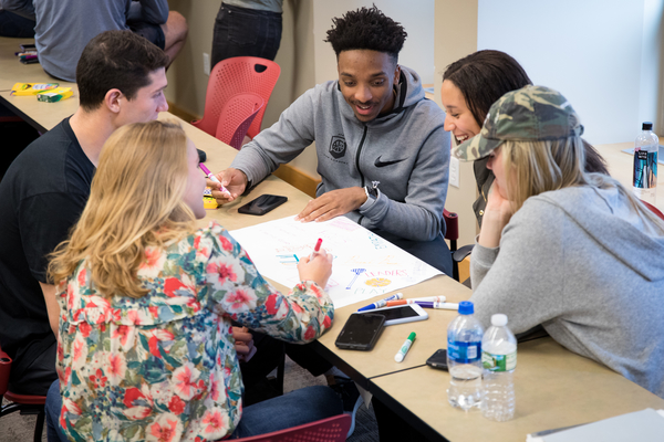 Students work together in class