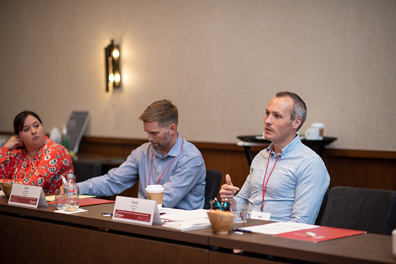 Sean McCrory seated with two other participants