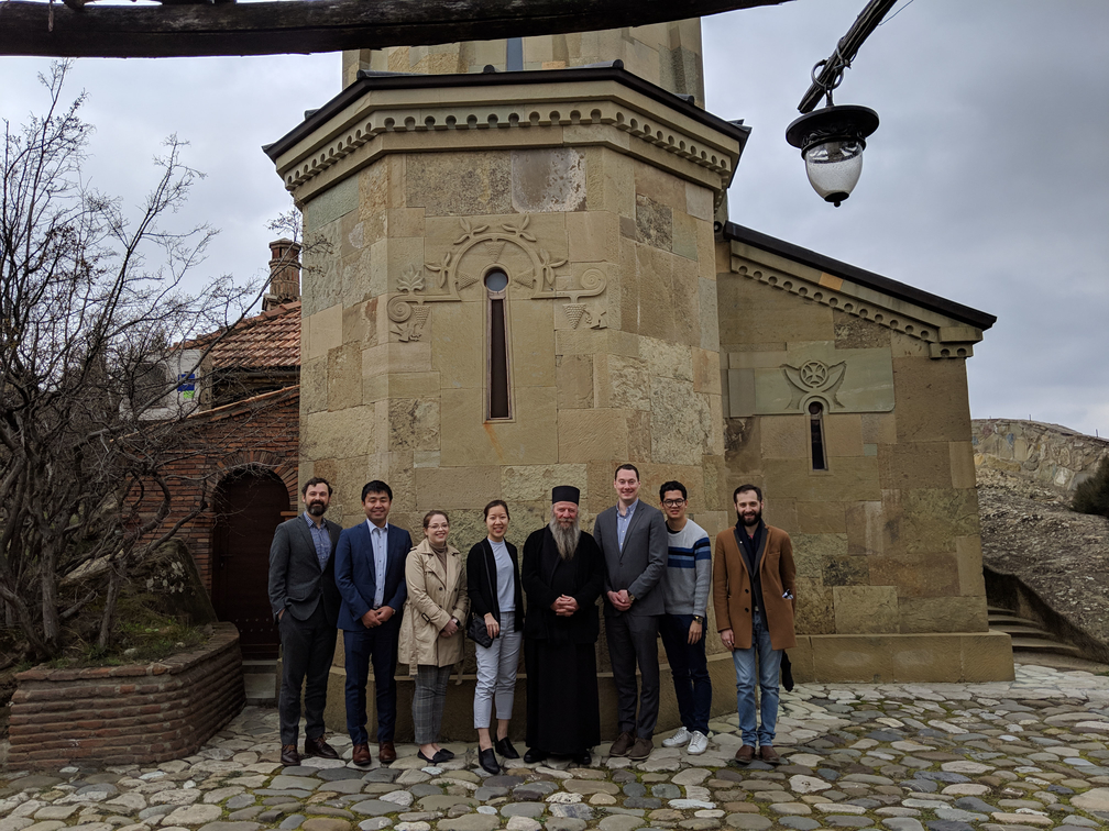 The team standing outside a church