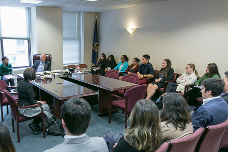 Class of ILR and SHA students listen to an arbitration case