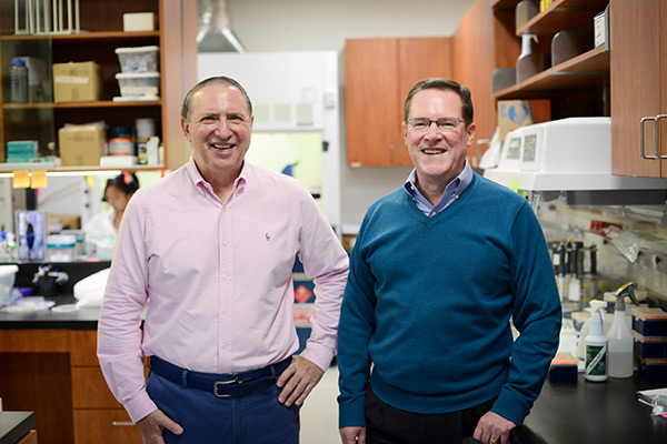Tim Brown and Sandy Argabrite in the lab at Evolve Biosystems