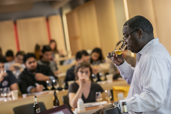 Doug Miller evaluates a beer in his class.
