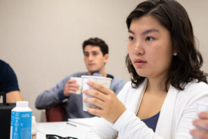 SHA student Wendy Yu '19 tastes a coffee sample in class.