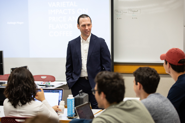 Jacob Chestnut interacts with students in class.