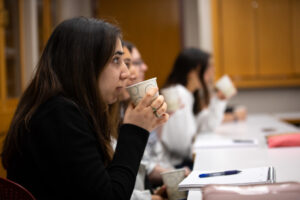 Eesha Chona '20 (Hum Ec) listens in class during a coffee tasting.