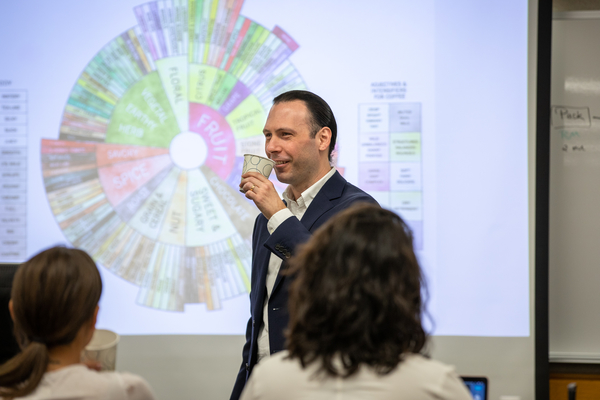 Jacob Chestnut leads a coffee tasting with his students in The Business of Coffee: From Farm to Cup.