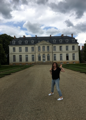 Adrienne Hein in front of the chateau de Grand Luce