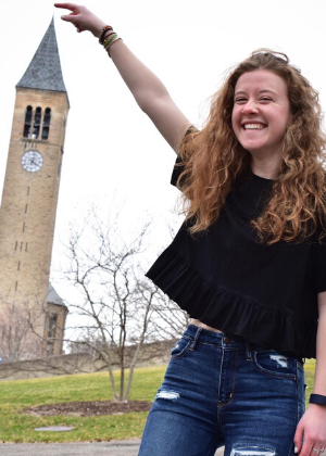 Dani Cohen with the Cornell clock tower