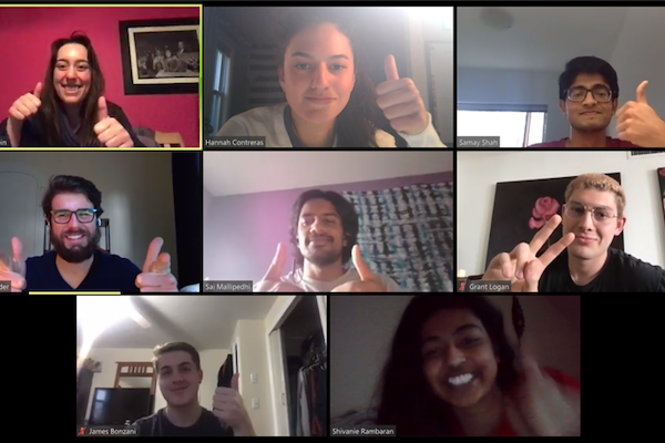 Students on the Cornell team are giving the thumbs up sign from their individual homes