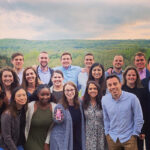 Alt text: Students in the Park Fellows Class of 2020 pose for a group photo at an outdoor event.