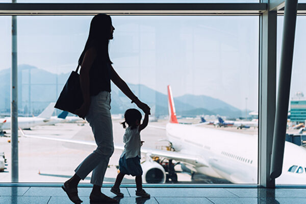 A woman and child hurry