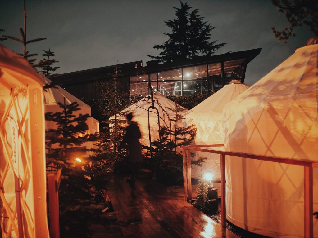 People dine in special yurts to proviode social distance during a pandemic.