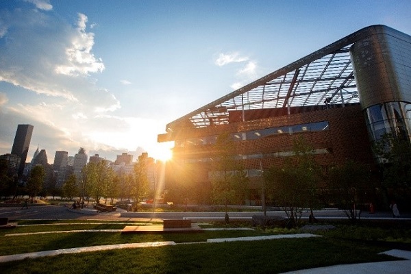 Image of Cornell Tech campus with city skyline in background