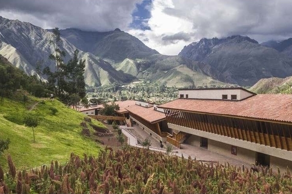 a hotel situated in a lush, Mountainous landscape