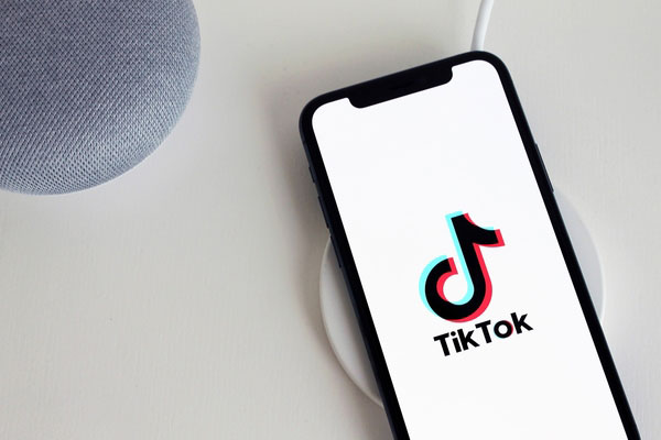 Photo of smartphone with the TikTok app logo on its screen