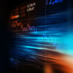 financial graph on technology abstract background – electronic screen at an angle, blurred at either edge