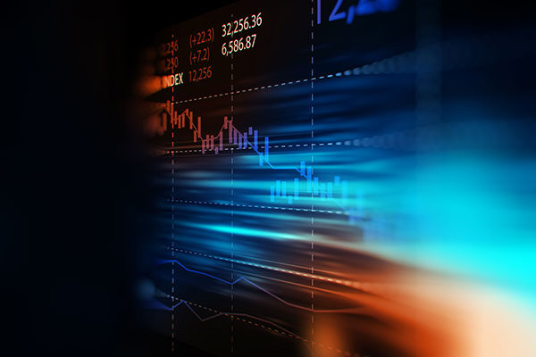 financial graph on technology abstract background – electronic screen at an angle, blurred at either edge