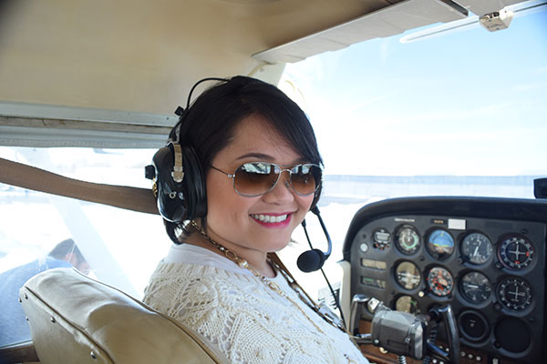 Gage Javier in the cockpit of a small airplane