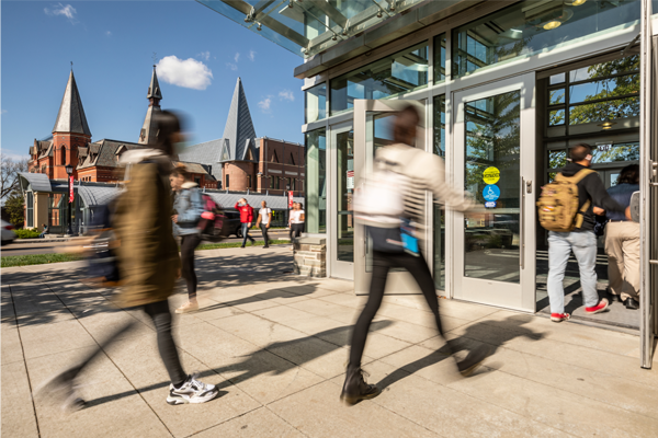 students walking into statler hall