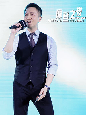 Steve Cheng singing and holding a microphone