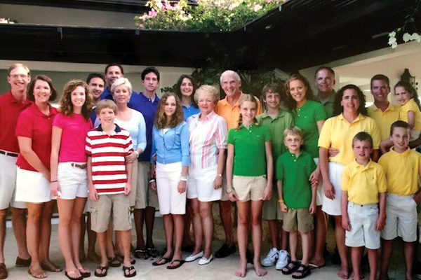 Large group photo of adults and children, members of several generations of the Chuck and Joanne Knight family