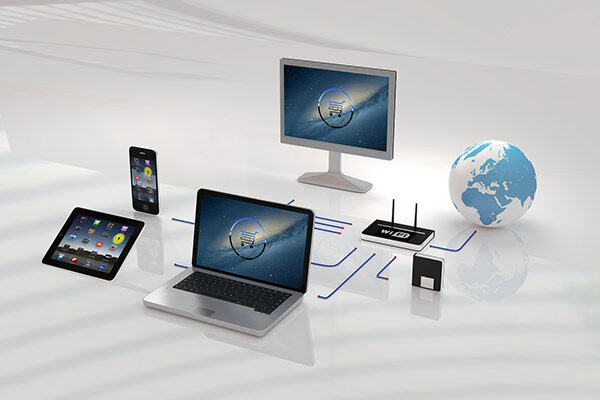 photo of a smartphone, iPad, laptop computer, computer monitor, and a globe on a white bckground
