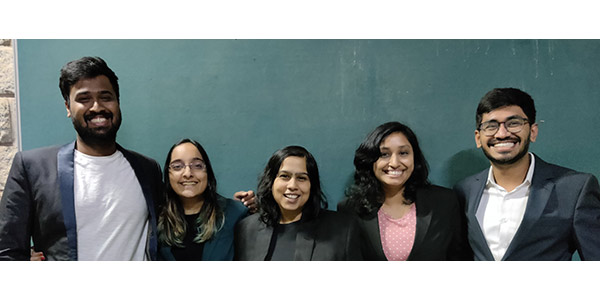 two men and three women side by side and smiling