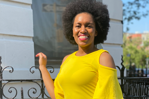 Jessica Ogonor smiling at a gate