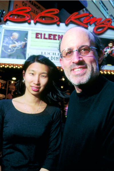 Nari Matsuura and Barry Massarsky standing in front of a theatre marquis that reads "B.B.King".