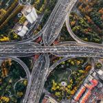 overhead photo of a multi-layered highway cloverleaf.