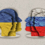illustration of 3 profiles in the Ukraine flag's colors, blue and yellow, facing 3 profiles in the Russian flag's colors, white, blue, and red.
