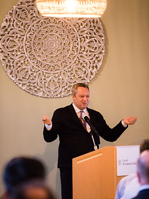 A man at a podium speaking.