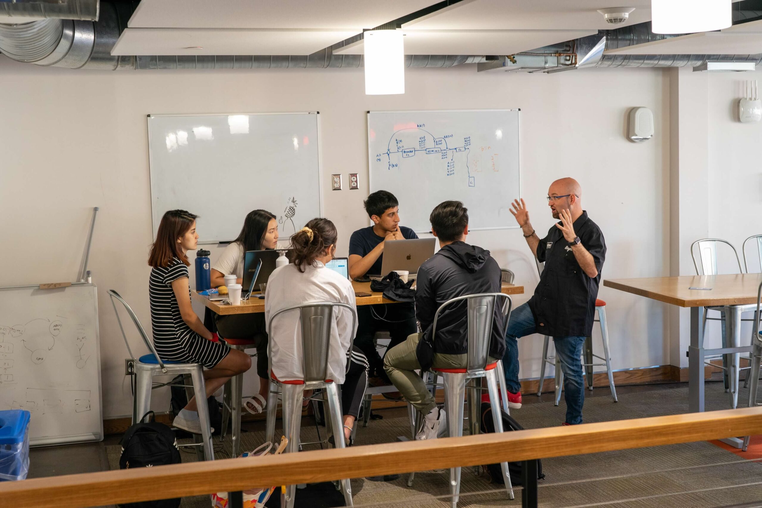 A team collaborating during Hospitality Hackathon.