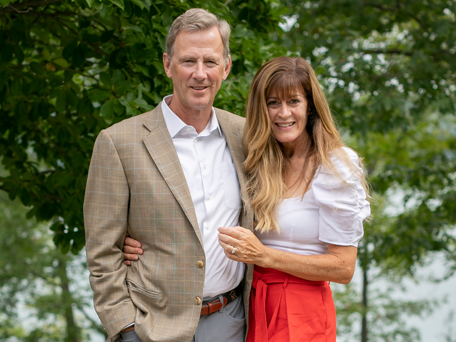 Peter and Stephanie Nolan standing outside their home.