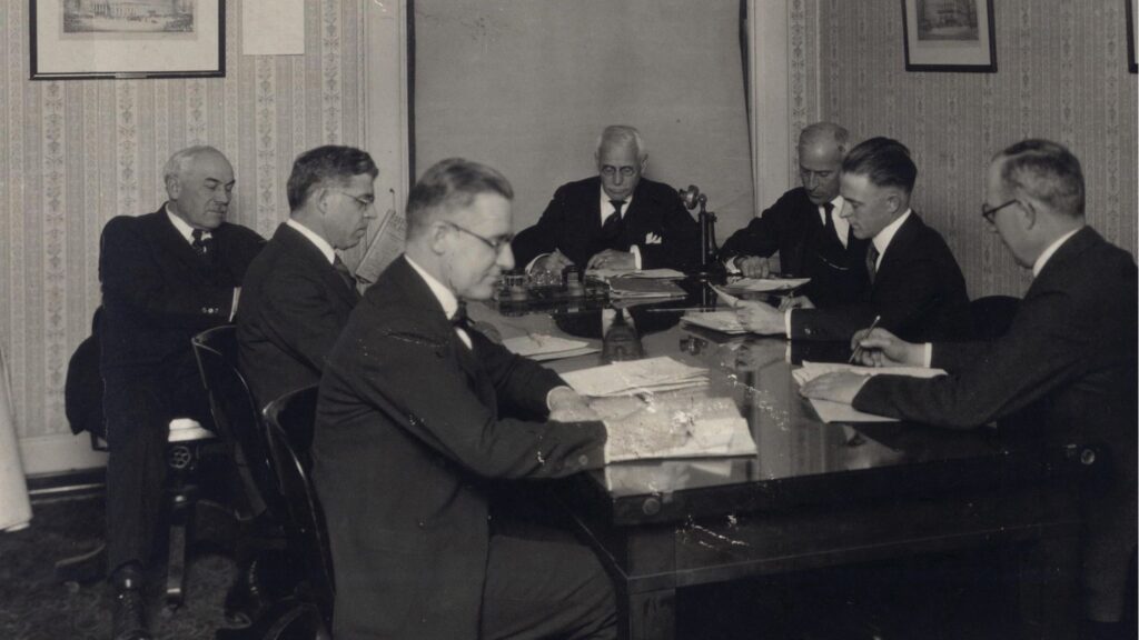 Ellsworth Statler conducts a board meeting in 1925.