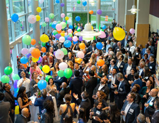 Hotel Ezra Cornell cocktail reception in the Beck Center with balloons.