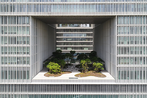 an open-air garden six stories sitting in the middle of a unique office building.