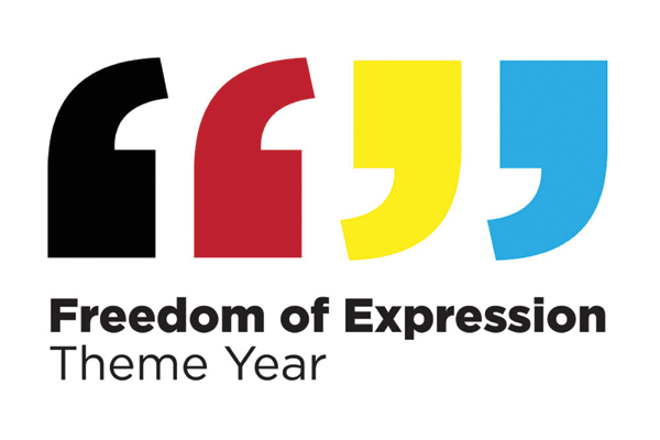 freedom of expression image with double quotation marks in black, red, yellow, and blue.