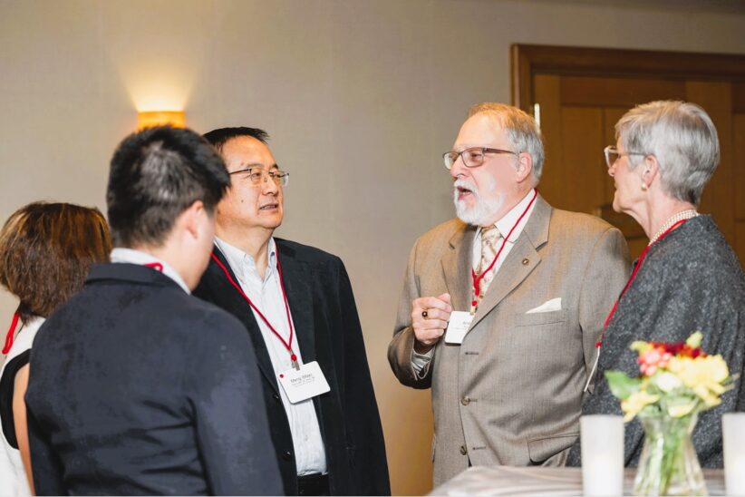 Meng Zhou, M.S. ’92, Ph.D. ’96, and his doctoral advisor, E.V. Baker Professor of Agricultural Economics Emeritus Andrew Novakovic.