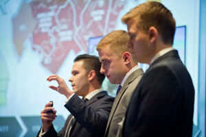 Group speaking at the Cornell Real Estate Case competition 