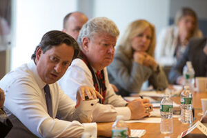 Group talking at the 2014 Cornell Retail Real Estate Roundtable