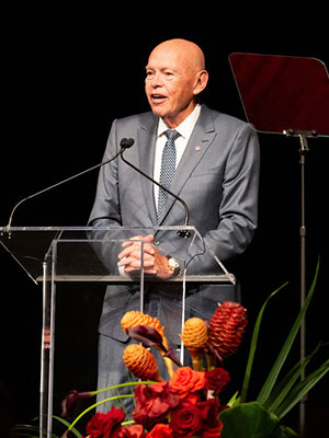 Leland Pillsbury standing at a podium and speaking.