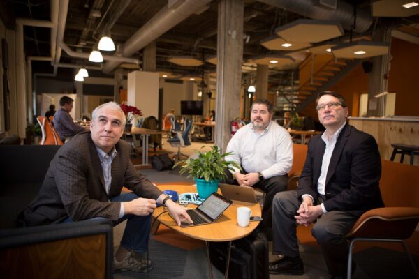 faculty watching a presentation