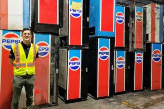 Taylor Hogenkamp (MBA '20) standing inside PepsiCo plant
