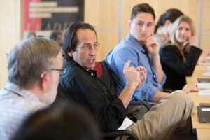 Professor speaking at the roundtable